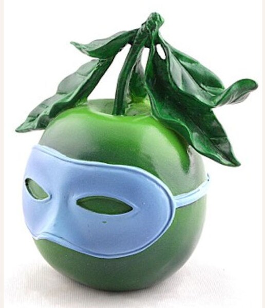 Pocket art memory of a voyage Margritte sculpture green apple statue museum surreal